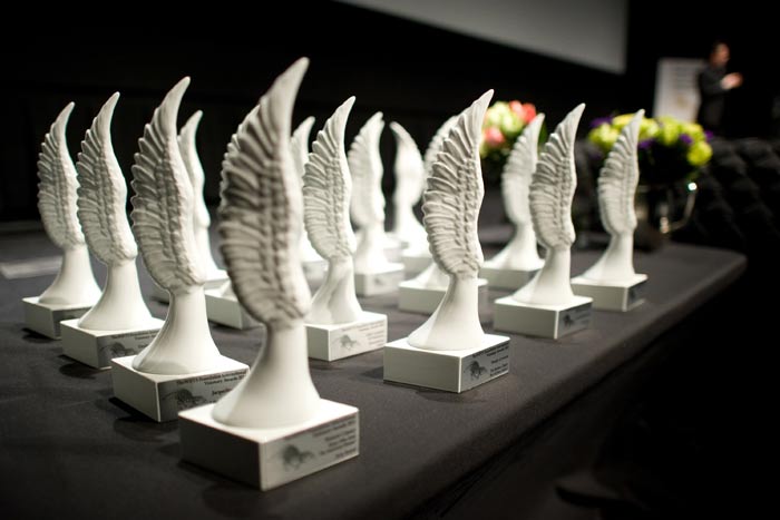 wing-shaped porcelain awards